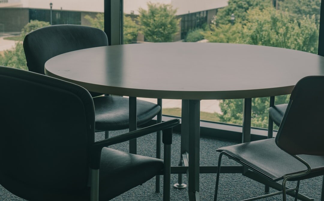 Moderator leading a round table business discussion 